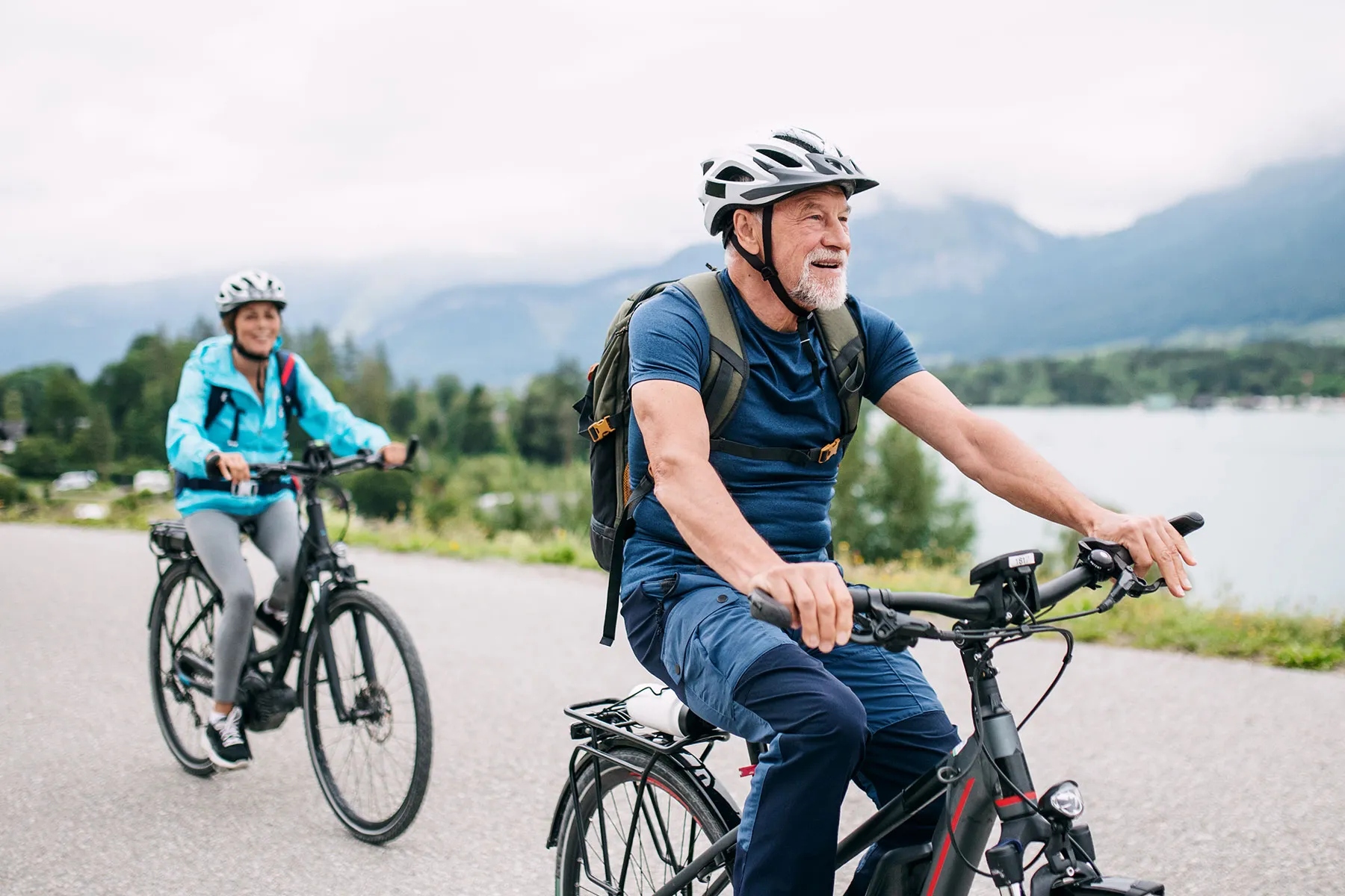 photo of senior couple bicycling