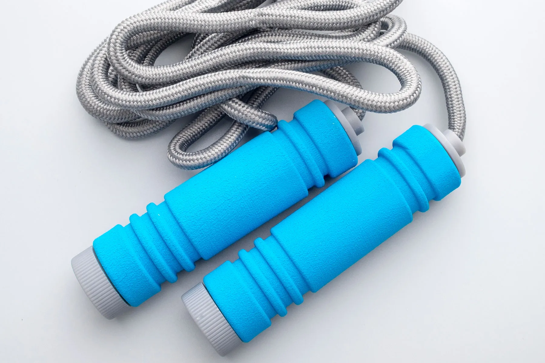 photo of a jump rope with blue handles