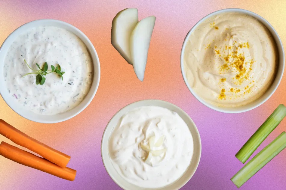 photo of  a variety of sour cream with vegetable stick on table