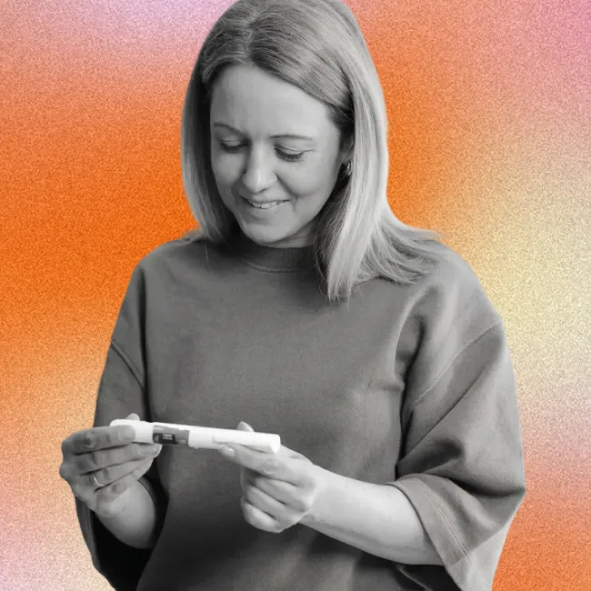 photo of a woman holding a medical injection device