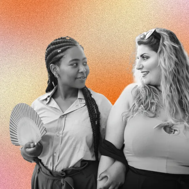 photo of two beautiful plus size women walking in the city