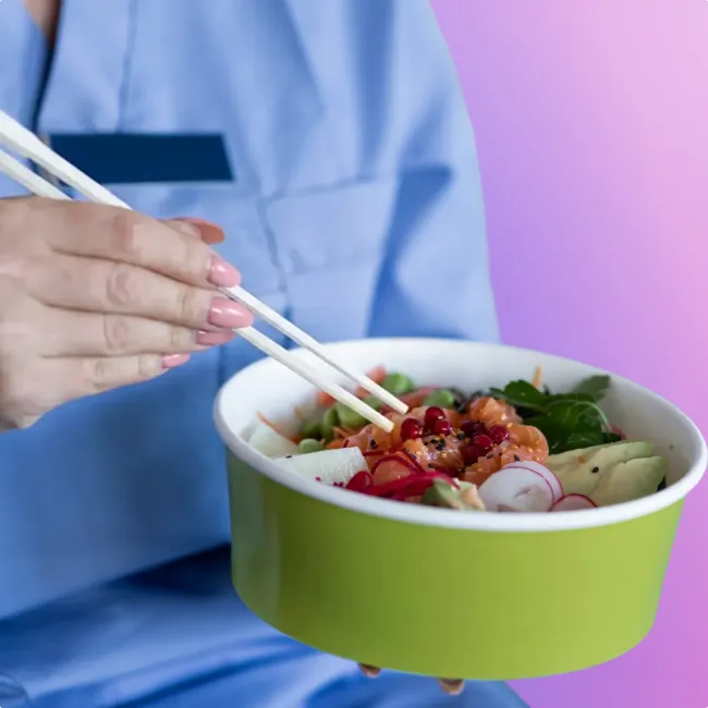 photo of a nurse easting Asian take-out food