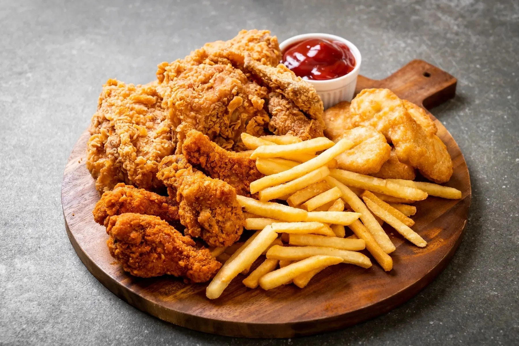 photo of fried chicken and french fries
