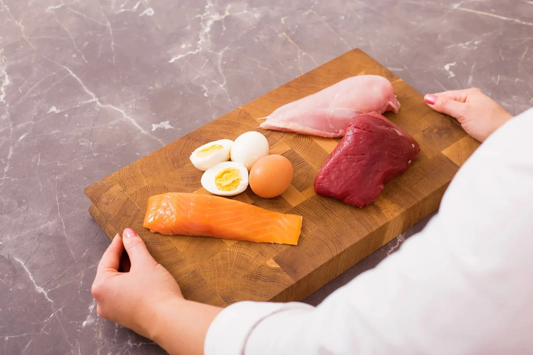 photo of woman preparing healthy meal
