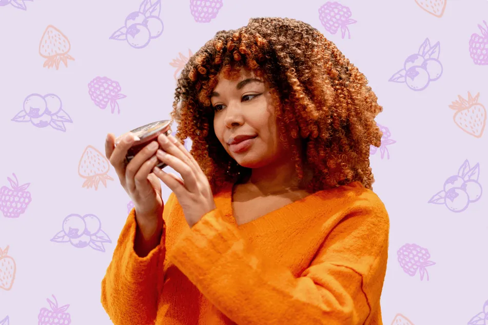 photo of a woman looking at a food label