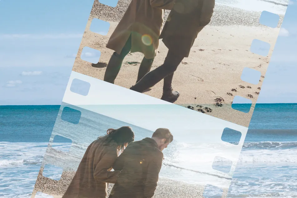 photo of a couple walking on beach in a film strip treatment