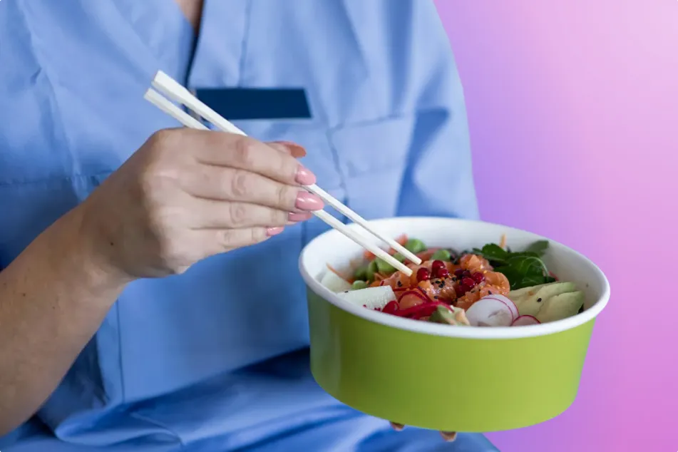 photo of a nurse easting Asian take-out food