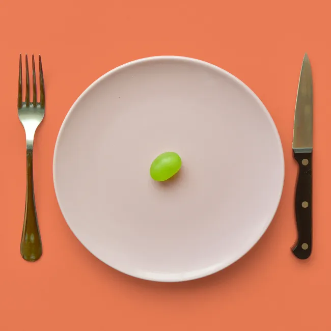 photo of single grape on a plate