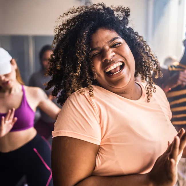photo of young woman in a dancing class 
