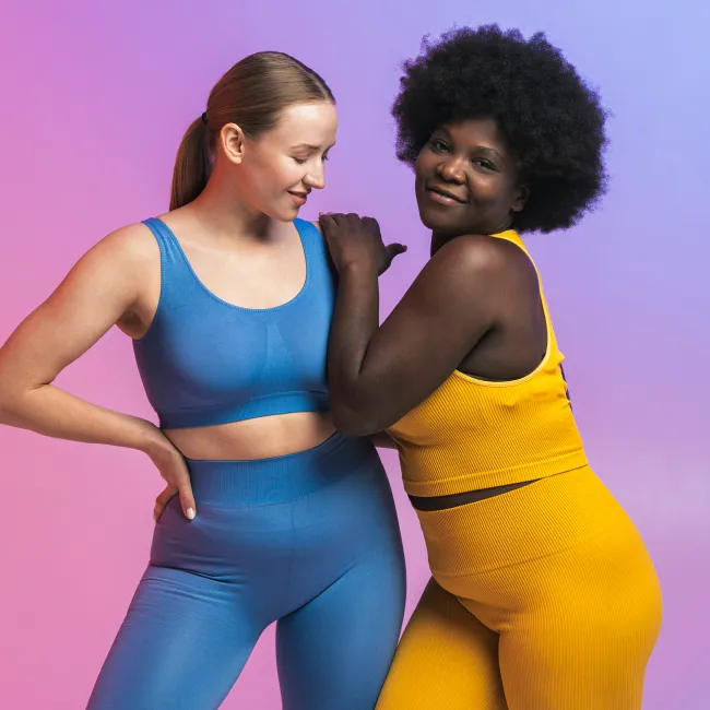 photo of Smiling young multiracial female friends