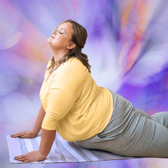 photo of plus size woman doing yoga over lilac background
