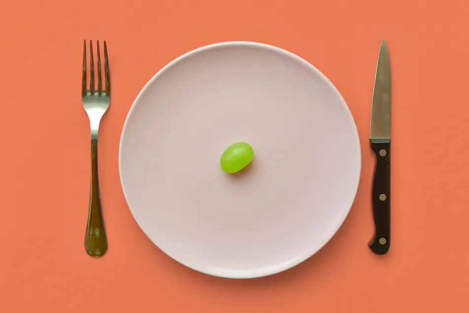 photo of single grape on a plate