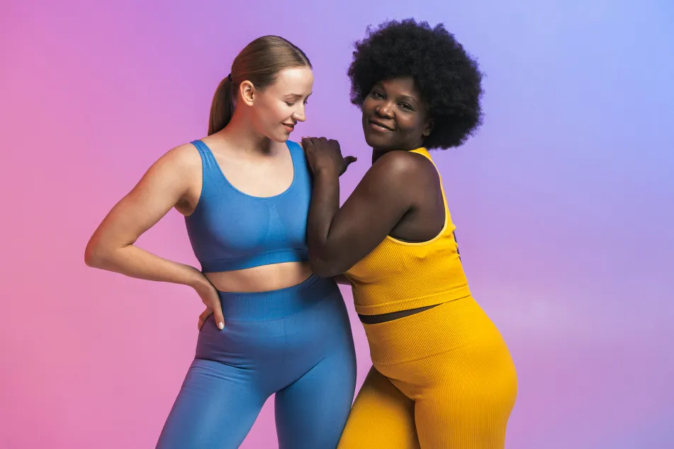 photo of Smiling young multiracial female friends