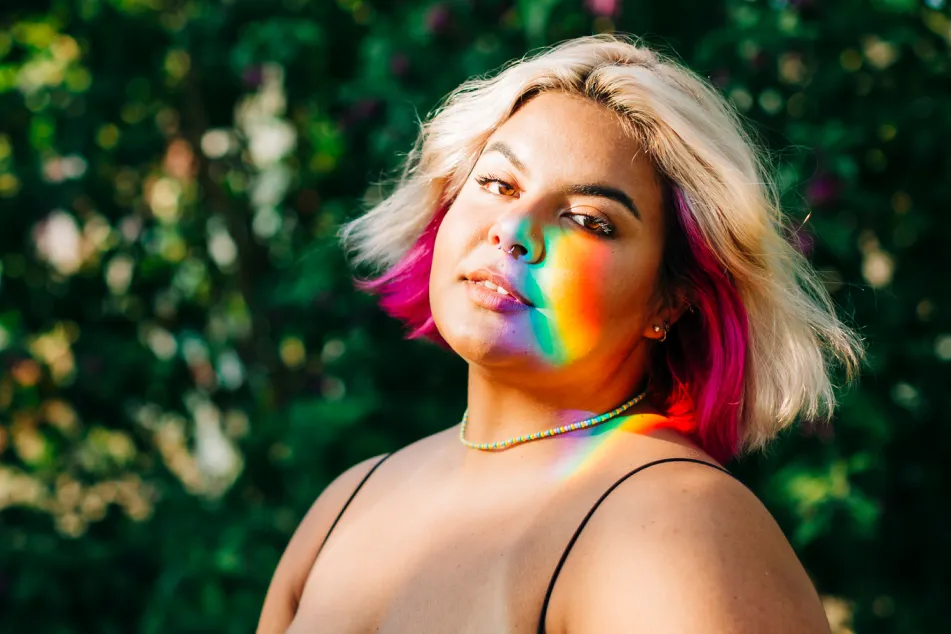 photo of a teenager with yellow and pink hair