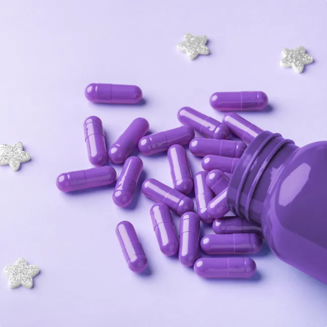 photo of pills spilling out of bottle 