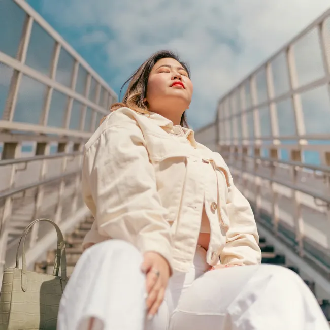 photo of woman in the city