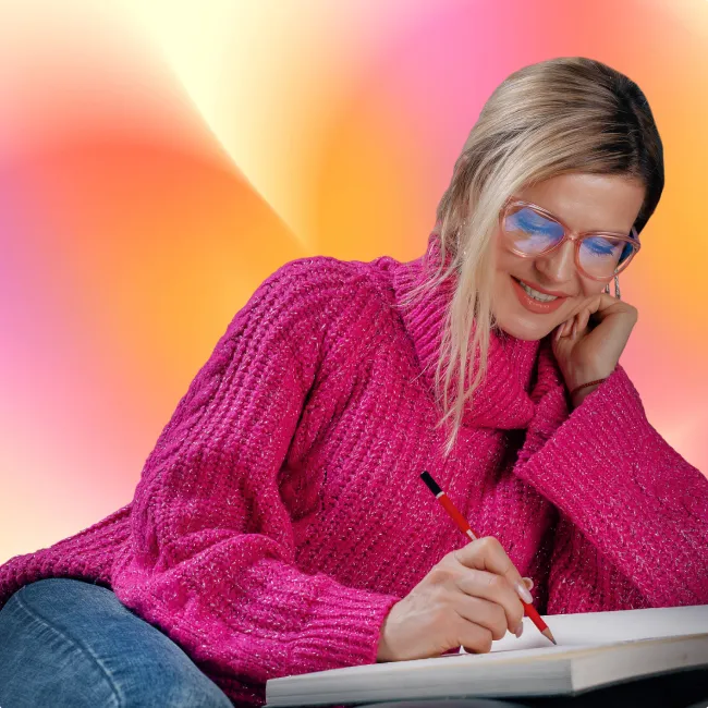 photo of woman writing in diary