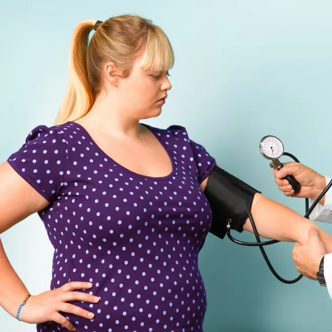 photo of Doctor taking blood pressure