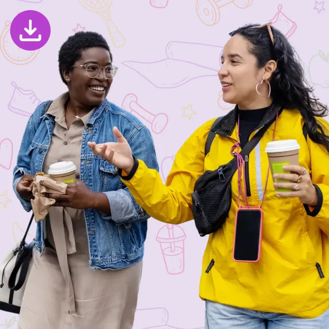 photo of Two female friends walking outside 