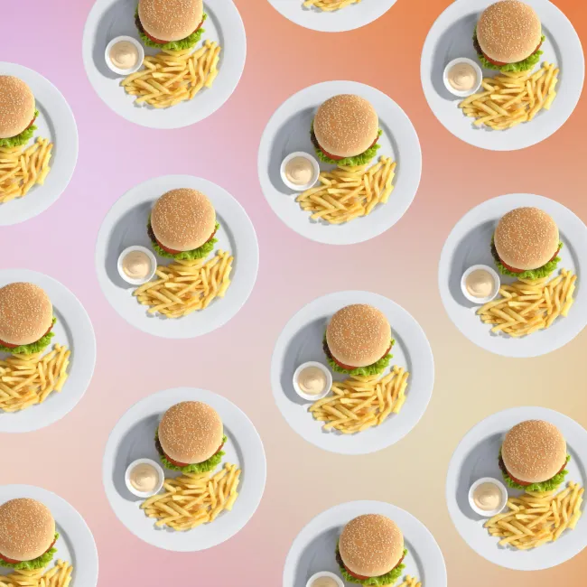 photo of hamburger with french fries and dipping sauce 