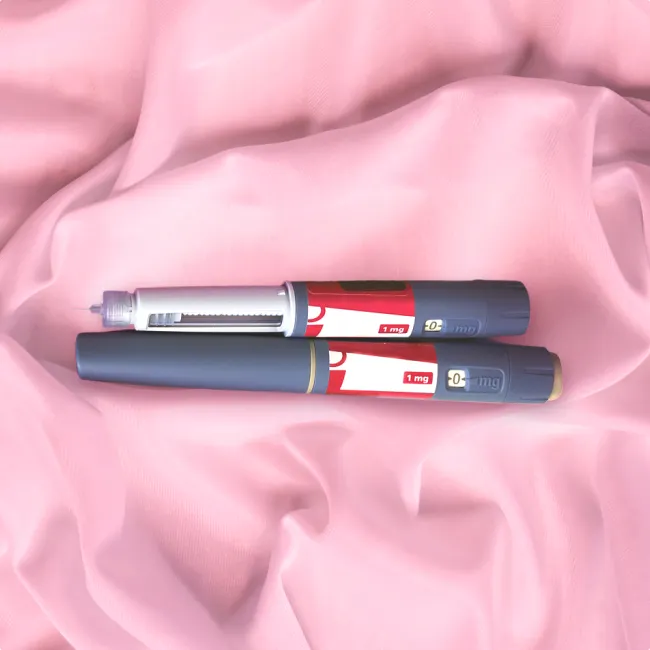 photo of Diabetes drug Ozempic on pink silk background cloth