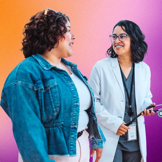 photo of doctor talking to patient