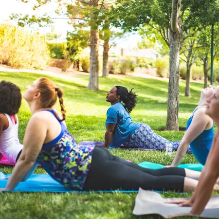 photo of group of women doing a yoga 