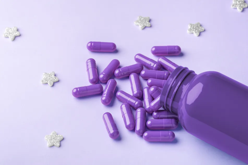 photo of pills spilling out of bottle 