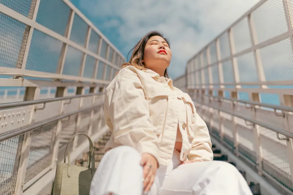 photo of woman in the city