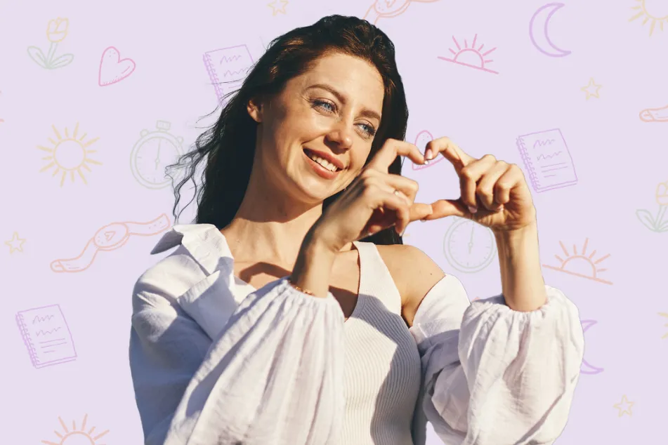 photo of woman forming a heart shape 