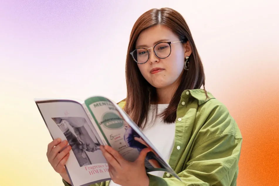 photo of woman reading a mental health magazine