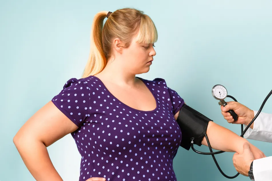 photo of Doctor taking blood pressure