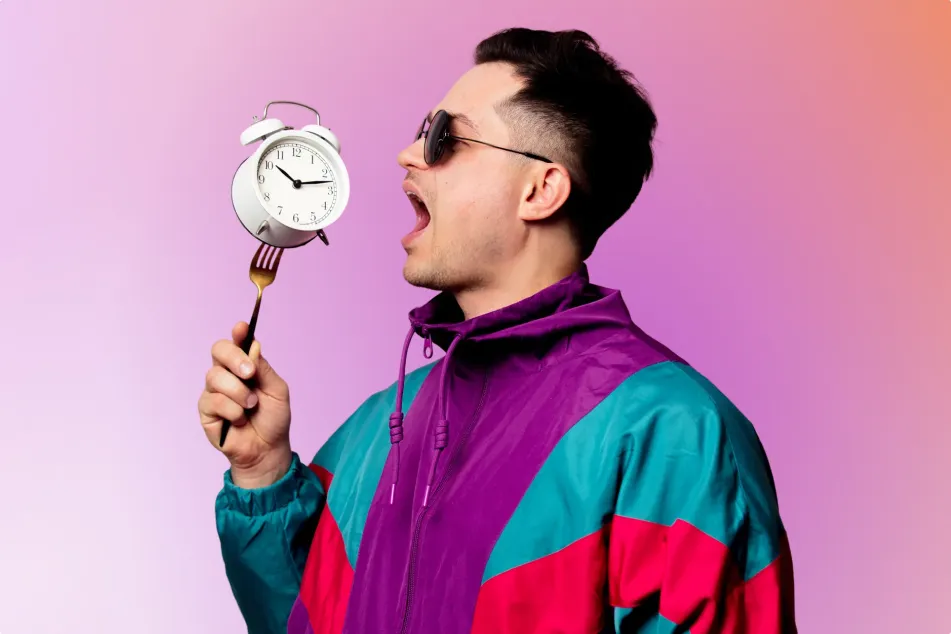 photo of guy with alarm clock on fork 