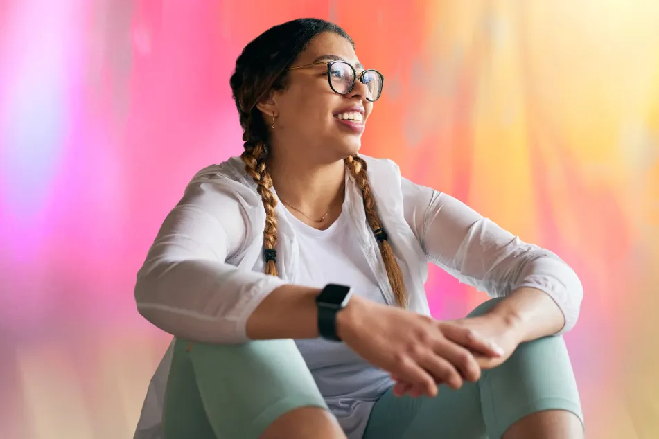 photo of sporty young woman taking a break