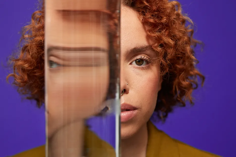 photo of distorted reflection of woman