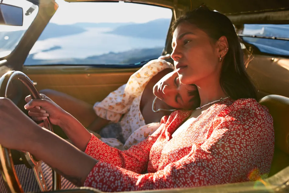 photo of Young woman driving car