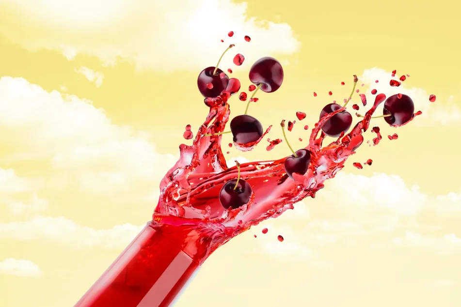 photo of Red cherry juice in drinking glass