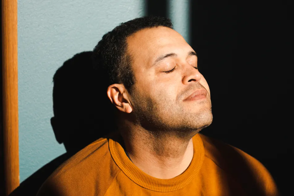 photo of Man with eyes closed