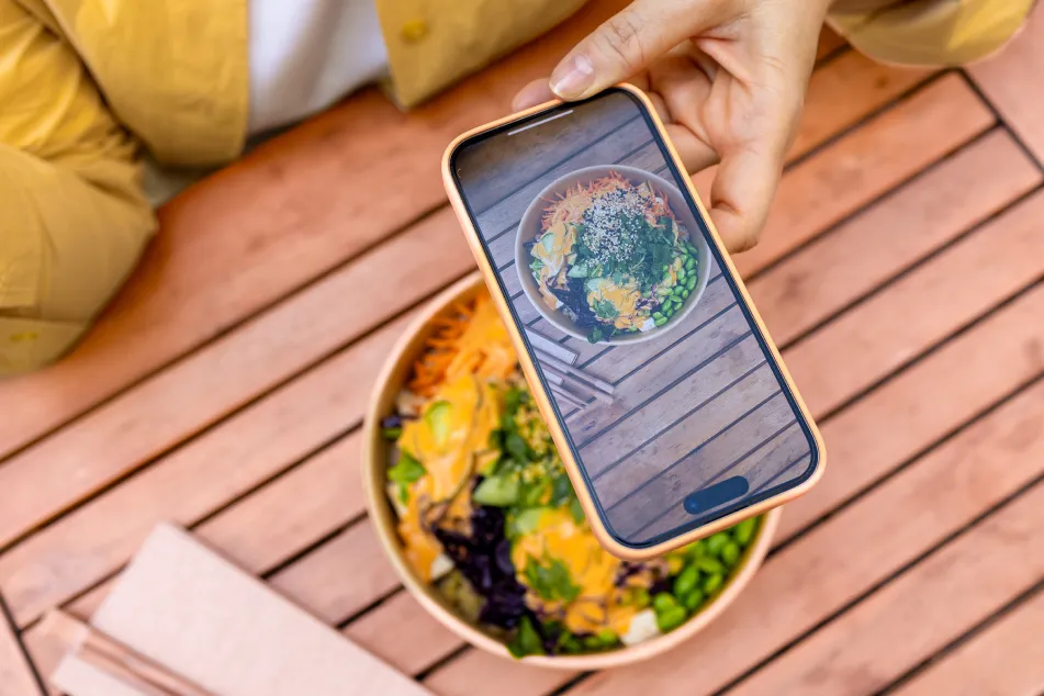 photo of making a photo with her smartphone