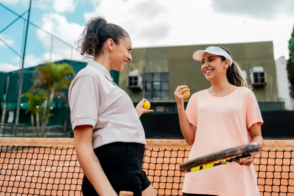 photo of Female tennis players talking