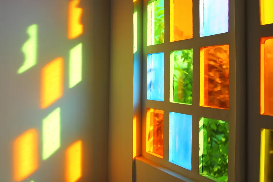 photo of windiow with multicolored glass 
