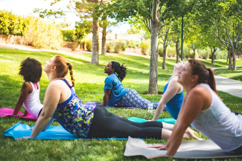 photo of group of women doing a yoga